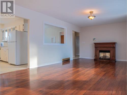 2013 Willowview Drive, Dawson Creek, BC - Indoor Photo Showing Living Room With Fireplace