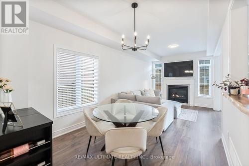 117 Branigan Crescent, Halton Hills, ON - Indoor Photo Showing Dining Room With Fireplace