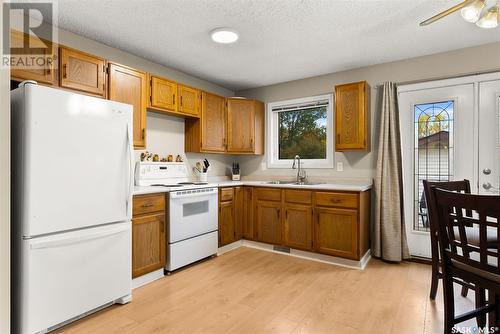 38 Carter Crescent, Regina, SK - Indoor Photo Showing Kitchen With Double Sink