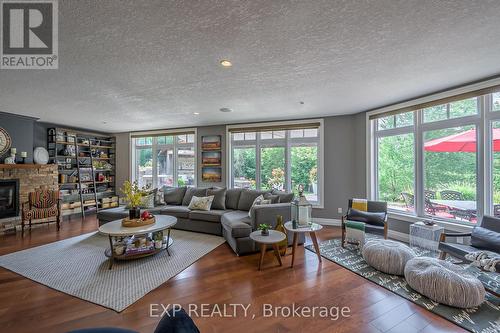 49 Byron Avenue, Thames Centre (Dorchester), ON - Indoor Photo Showing Living Room With Fireplace