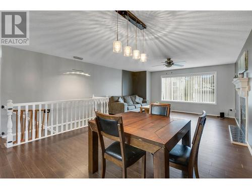 6144 Berger Place, Prince George, BC - Indoor Photo Showing Dining Room With Fireplace