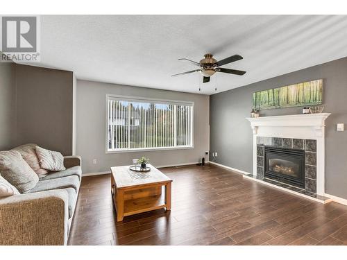 6144 Berger Place, Prince George, BC - Indoor Photo Showing Living Room With Fireplace