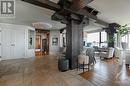 The heavily framed spaces boast arched wall relief accents and outstanding views. Light fixtures have a cloud like effect - 40 Boteler Street Unit#1102, Ottawa, ON  - Indoor Photo Showing Other Room 