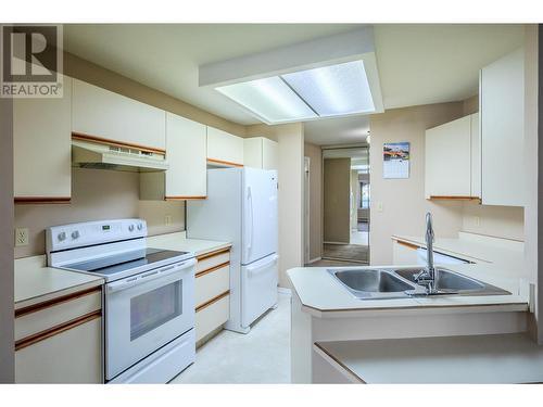 250 Scott Avenue Unit# 104, Penticton, BC - Indoor Photo Showing Kitchen With Double Sink