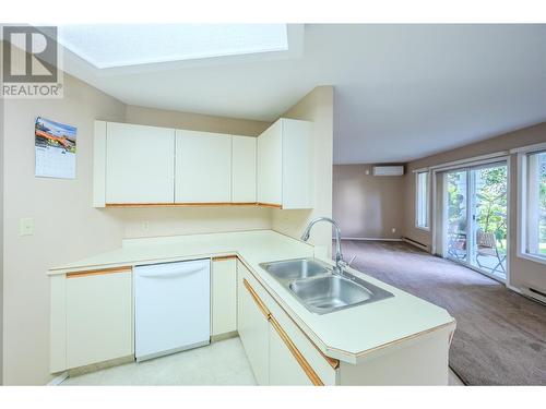 250 Scott Avenue Unit# 104, Penticton, BC - Indoor Photo Showing Kitchen With Double Sink