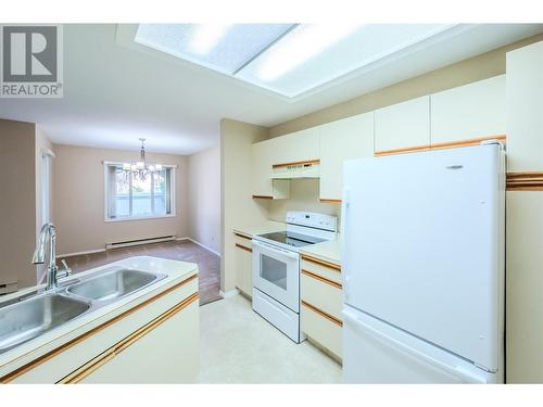 250 Scott Avenue Unit# 104, Penticton, BC - Indoor Photo Showing Kitchen With Double Sink