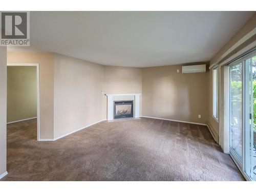 250 Scott Avenue Unit# 104, Penticton, BC - Indoor With Fireplace