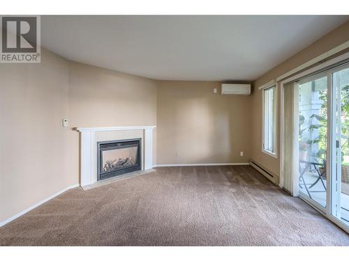 250 Scott Avenue Unit# 104, Penticton, BC - Indoor With Fireplace