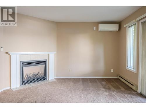 250 Scott Avenue Unit# 104, Penticton, BC - Indoor With Fireplace