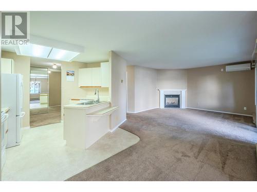 250 Scott Avenue Unit# 104, Penticton, BC - Indoor With Fireplace