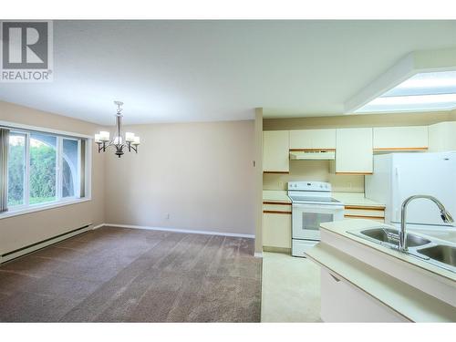 250 Scott Avenue Unit# 104, Penticton, BC - Indoor Photo Showing Kitchen With Double Sink