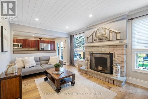 62 Wyndfield Crescent, Whitby, ON - Indoor Photo Showing Living Room With Fireplace