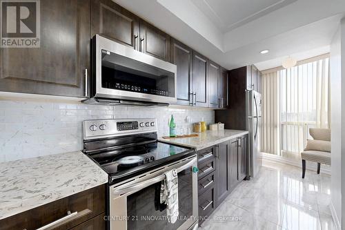 410 - 2550 Lawrence Avenue E, Toronto, ON - Indoor Photo Showing Kitchen