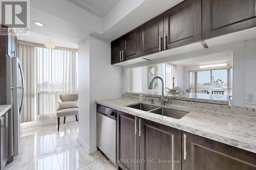 410 - 2550 Lawrence Avenue E, Toronto, ON - Indoor Photo Showing Kitchen With Double Sink With Upgraded Kitchen