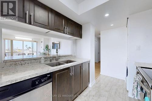 410 - 2550 Lawrence Avenue E, Toronto, ON - Indoor Photo Showing Kitchen With Double Sink With Upgraded Kitchen