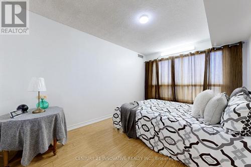 410 - 2550 Lawrence Avenue E, Toronto, ON - Indoor Photo Showing Bedroom