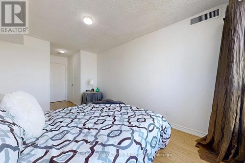 410 - 2550 Lawrence Avenue E, Toronto, ON - Indoor Photo Showing Bedroom