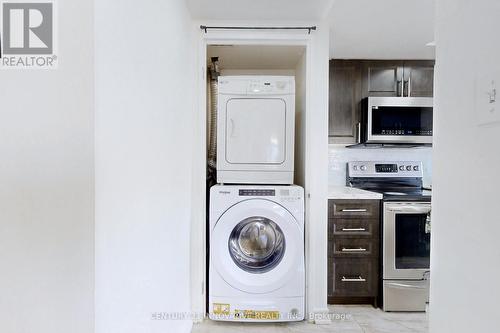 410 - 2550 Lawrence Avenue E, Toronto, ON - Indoor Photo Showing Laundry Room