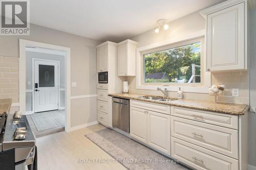 Updated kitchen with huge window looking into yard - 191 Bethany Street, North Middlesex (Parkhill), ON - Indoor Photo Showing Kitchen With Double Sink