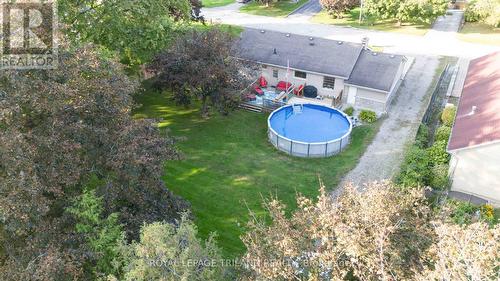 Yard offers both sun and shade - 191 Bethany Street, North Middlesex (Parkhill), ON - Outdoor With Above Ground Pool