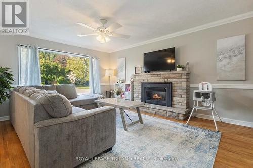 Living room with gas insert fireplace - 191 Bethany Street, North Middlesex (Parkhill), ON - Indoor Photo Showing Living Room With Fireplace