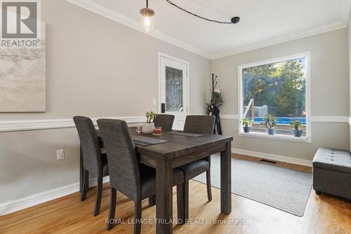 Open dining room large window overlooking pool - 191 Bethany Street, North Middlesex (Parkhill), ON - Indoor Photo Showing Dining Room