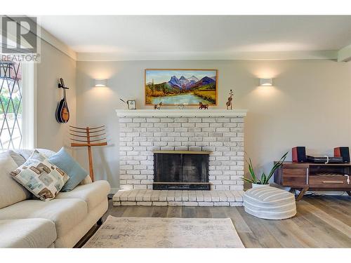 4531 Raymer Road, Kelowna, BC - Indoor Photo Showing Living Room With Fireplace