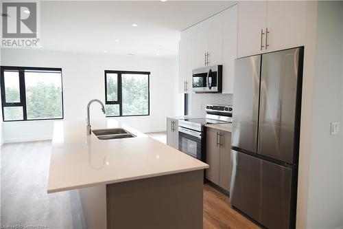 525 New Dundee Road Unit# 701, Kitchener, ON - Indoor Photo Showing Kitchen With Double Sink