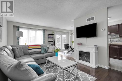 15 - 1921 Father Dalton Avenue, London, ON - Indoor Photo Showing Living Room With Fireplace