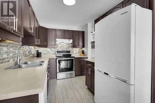 15 - 1921 Father Dalton Avenue, London, ON - Indoor Photo Showing Kitchen With Double Sink With Upgraded Kitchen