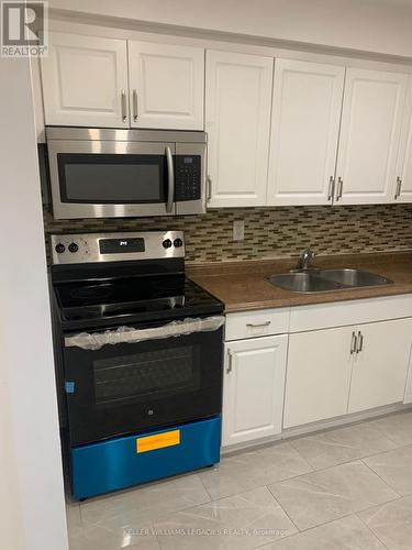 73 Enmount Drive, Brampton, ON - Indoor Photo Showing Kitchen With Double Sink