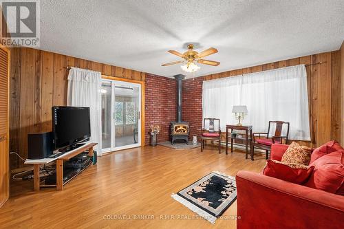 57 Fire Route 104, Galway-Cavendish And Harvey, ON - Indoor Photo Showing Living Room With Fireplace