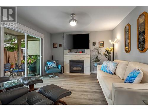 307 Sumac Road E, Kelowna, BC - Indoor Photo Showing Living Room With Fireplace