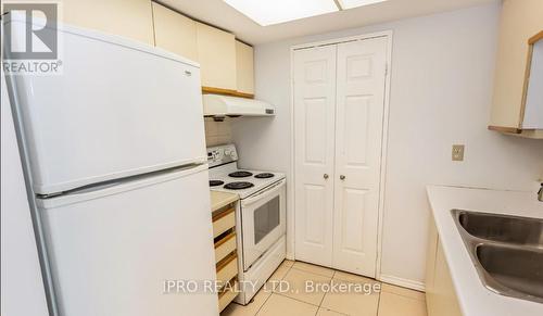 1202 - 265 Enfield Place S, Mississauga, ON - Indoor Photo Showing Kitchen With Double Sink