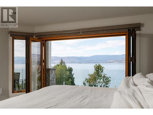 4760 Crighton Road, Kelowna, BC - Indoor Photo Showing Bedroom With Body Of Water