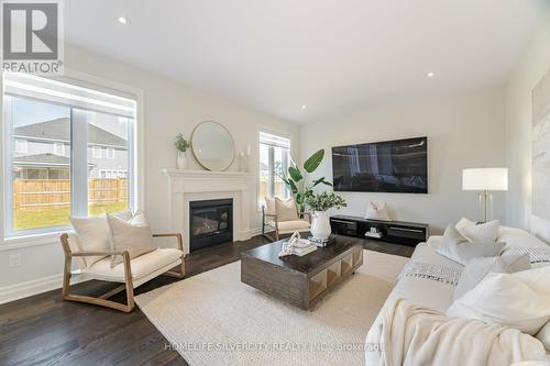 6512 Crown Grant Road, London, ON - Indoor Photo Showing Living Room With Fireplace