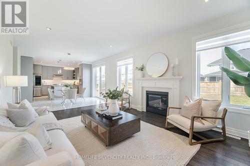 6512 Crown Grant Road, London, ON - Indoor Photo Showing Living Room With Fireplace