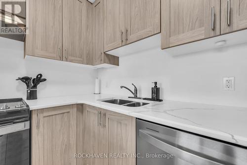 212 - 5 Hamilton Street N, Hamilton, ON - Indoor Photo Showing Kitchen With Double Sink