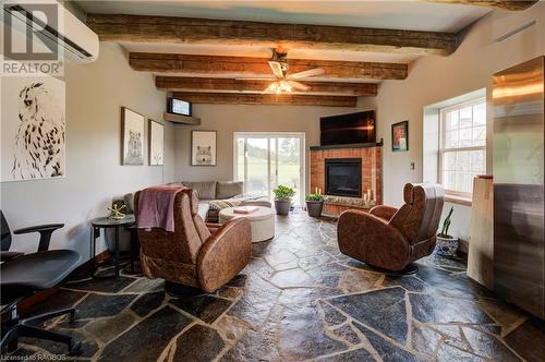 776711 Highway 10, Chatsworth, ON - Indoor Photo Showing Living Room With Fireplace