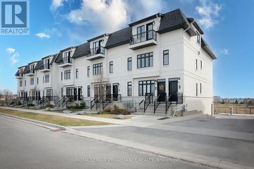 206 - 1005 Terra Verde Way, Kingston, ON - Outdoor With Facade