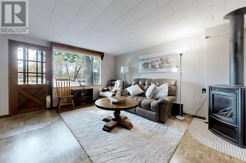 25985 Woodbine Avenue, Georgina, ON - Indoor Photo Showing Living Room With Fireplace