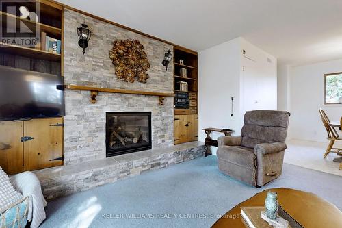 25985 Woodbine Avenue, Georgina, ON - Indoor Photo Showing Living Room With Fireplace