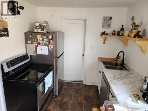 1385 6 Highway, Cherryville, BC - Indoor Photo Showing Kitchen With Double Sink