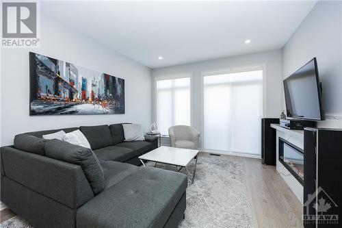 60 Kayenta Street, Ottawa, ON - Indoor Photo Showing Living Room With Fireplace