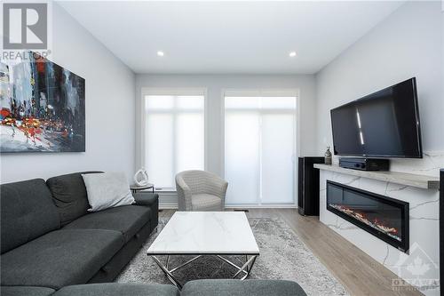 60 Kayenta Street, Ottawa, ON - Indoor Photo Showing Living Room With Fireplace