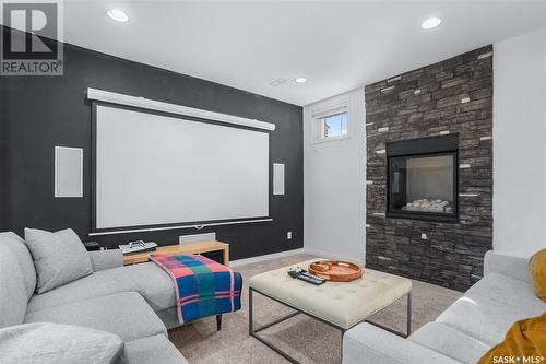 306 Maguire Court, Saskatoon, SK - Indoor Photo Showing Living Room With Fireplace