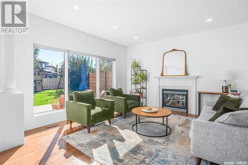 306 Maguire Court, Saskatoon, SK - Indoor Photo Showing Living Room With Fireplace