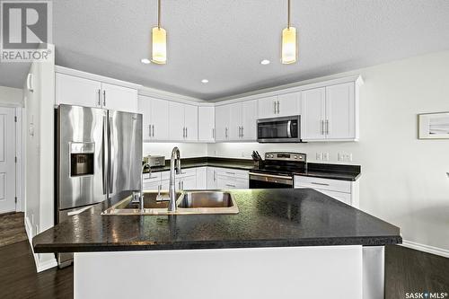 5109 Aerial Crescent, Regina, SK - Indoor Photo Showing Kitchen With Stainless Steel Kitchen With Double Sink With Upgraded Kitchen