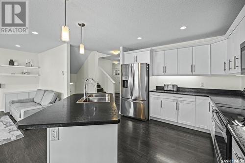 5109 Aerial Crescent, Regina, SK - Indoor Photo Showing Kitchen With Stainless Steel Kitchen With Double Sink With Upgraded Kitchen