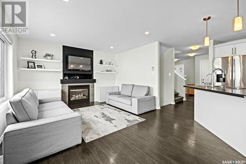 5109 Aerial Crescent, Regina, SK - Indoor Photo Showing Living Room With Fireplace